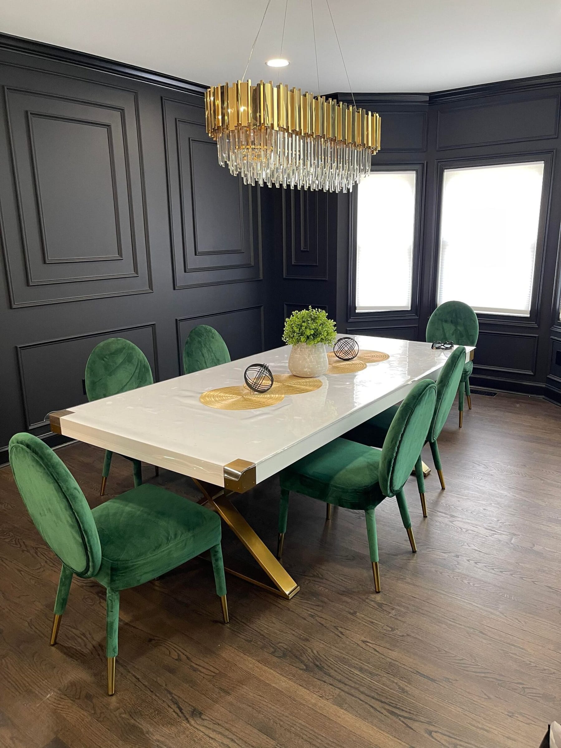 Navy dining room, chandelier dusted